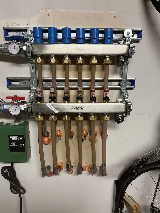 Plumber performing Gas Leak Detection at a residential property in Olivette